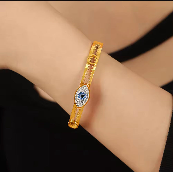 Radiant Protective Eye Gold Bangle